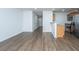 Spacious living room with hardwood floors and kitchen access at 275 Jackson St, Goose Creek, SC 29445