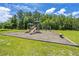playground with slides and swings at 275 Jackson St, Goose Creek, SC 29445