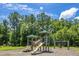 Simple playground with two slides and a swing set at 275 Jackson St, Goose Creek, SC 29445