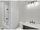 Modern bathroom with a white subway tile shower, stylish fixtures, and a marble countertop vanity at 3874 Srevir Rd, Johns Island, SC 29455