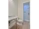 Small bathroom with pedestal sink and shower at 3874 Srevir Rd, Johns Island, SC 29455