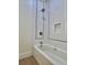 Clean bathroom with white subway tile and a bathtub at 3874 Srevir Rd, Johns Island, SC 29455
