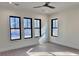 Spacious bedroom with hardwood floors and multiple windows at 3874 Srevir Rd, Johns Island, SC 29455