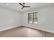 Bright bedroom featuring hardwood floors, neutral walls, and a modern ceiling fan at 3874 Srevir Rd, Johns Island, SC 29455