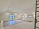 Spacious bonus room with hardwood floors and multiple windows at 3874 Srevir Rd, Johns Island, SC 29455