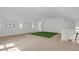Spacious upper-level bonus room with wood floors, natural light, and ample open space at 3874 Srevir Rd, Johns Island, SC 29455