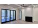 Living room with fireplace, hardwood floors, and sliding glass doors at 3874 Srevir Rd, Johns Island, SC 29455
