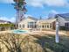 Inviting backyard with a pool and pergola at 606 Pointe Of Oaks Rd, Summerville, SC 29485