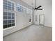 Bright bedroom with carpet, ceiling fan and large windows at 606 Pointe Of Oaks Rd, Summerville, SC 29485