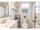 Clean bathroom with white vanity and a shower/tub combo at 7 Kracke St # 7 1/2 B, Charleston, SC 29403