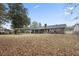 Large backyard with covered patio and detached shed at 8626 Vistavia Rd, North Charleston, SC 29406