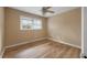 Bright bedroom featuring hardwood floors and neutral walls at 8626 Vistavia Rd, North Charleston, SC 29406