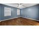 Bedroom with hardwood floors and blue walls at 8626 Vistavia Rd, North Charleston, SC 29406