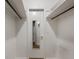 Walk-in closet with mirrored doors and ample hanging space at 8626 Vistavia Rd, North Charleston, SC 29406