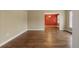 Dining room with hardwood floors and an adjacent living area at 8626 Vistavia Rd, North Charleston, SC 29406