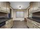 Eat-in kitchen with granite countertops and light wood cabinets at 8626 Vistavia Rd, North Charleston, SC 29406