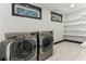 Laundry room with LG washer and dryer, shelving, and window at 970 Lansing Dr, Mount Pleasant, SC 29464