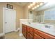 Bathroom features double sinks, wood cabinets, and a shower/tub combo at 104 Pavilion St, Summerville, SC 29483