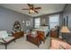 Charming bedroom with antique furniture and neutral walls at 104 Pavilion St, Summerville, SC 29483