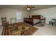 Bedroom with sleigh bed and large area rug at 104 Pavilion St, Summerville, SC 29483