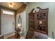 Bright entryway with antique cabinet and hardwood floors at 104 Pavilion St, Summerville, SC 29483