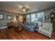 Spacious living room with hardwood floors and large windows at 104 Pavilion St, Summerville, SC 29483