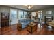 Spacious living room with hardwood floors and large windows at 104 Pavilion St, Summerville, SC 29483