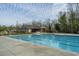 Community swimming pool with a pool house at 104 Pavilion St, Summerville, SC 29483