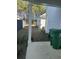 Small backyard with a concrete patio and green waste bin at 106 Helena Park Dr Dr, Summerville, SC 29486