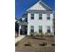 Two-story white house with a black front door and landscaping at 106 Helena Park Dr Dr, Summerville, SC 29486