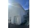 White exterior side view with a door and landscaping at 106 Helena Park Dr Dr, Summerville, SC 29486