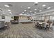 Large ballroom area with tables, chairs, dance floor and chandeliers at 123 Leeward Lndg, Summerville, SC 29486