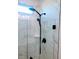 Shower with marble tile and modern fixtures at 123 Leeward Lndg, Summerville, SC 29486