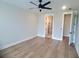 Bedroom with hardwood flooring, and doorway to a bathroom at 123 Leeward Lndg, Summerville, SC 29486