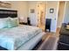 Bright bedroom with a king bed and access to en-suite bathroom at 123 Leeward Lndg, Summerville, SC 29486