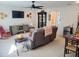 Open bonus room with a TV, seating area, and mini-fridge at 123 Leeward Lndg, Summerville, SC 29486