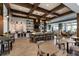 Modern cafe space with coffered ceilings, a central island, and comfortable seating for residents to enjoy at 123 Leeward Lndg, Summerville, SC 29486