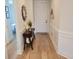Bright entryway with hardwood floors and decorative accents at 123 Leeward Lndg, Summerville, SC 29486