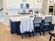 Modern kitchen with a large island and white cabinetry at 123 Leeward Lndg, Summerville, SC 29486