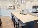 Kitchen island with seating and quartz countertop at 123 Leeward Lndg, Summerville, SC 29486