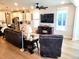 Relaxing living room with hardwood floors and comfortable seating area at 123 Leeward Lndg, Summerville, SC 29486