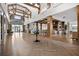 The grand lobby features high ceilings, stylish decor, and comfortable seating areas for community residents at 123 Leeward Lndg, Summerville, SC 29486
