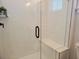 Clean shower with white subway tile and built-in seat at 123 Leeward Lndg, Summerville, SC 29486