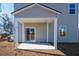 Covered back patio with sliding glass doors at 134 Vistawood Dr, Charleston, SC 29414