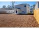 Large backyard with a wooden fence at 134 Vistawood Dr, Charleston, SC 29414