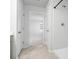 Clean bathroom with shower, neutral tile floors, and access to other rooms at 134 Vistawood Dr, Charleston, SC 29414