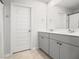 Bathroom with grey vanity, double sinks, and a shower/tub combo at 134 Vistawood Dr, Charleston, SC 29414