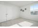 Well-lit bedroom with neutral carpeting and double doors to closet at 134 Vistawood Dr, Charleston, SC 29414