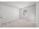 Bright bedroom with a window and neutral carpeting at 134 Vistawood Dr, Charleston, SC 29414