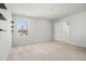 Simple bedroom with neutral carpeting, a window, and built-in shelving at 134 Vistawood Dr, Charleston, SC 29414